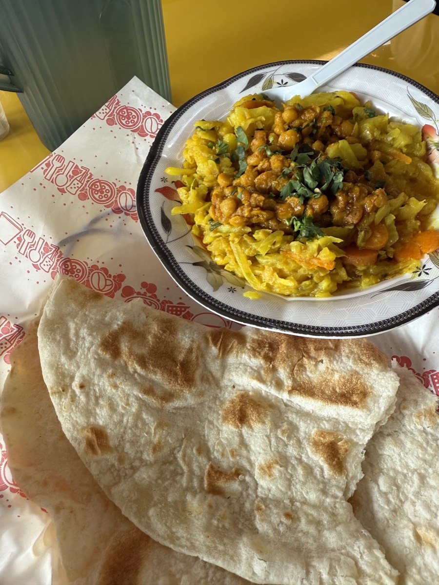 Chana and ghugni served with fresh hand-made paratha